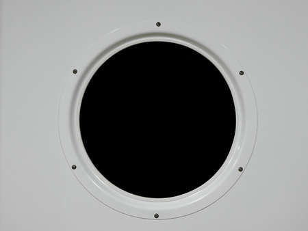 Metal porthole of a ship, black background, easy to change to your ownの写真素材