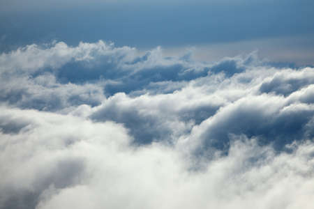 Above the clouds in the skyの写真素材