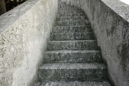 Old stairs leading up to a placeの写真素材