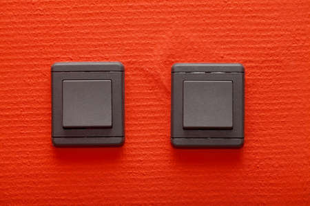 Lamp switches on a wallの写真素材
