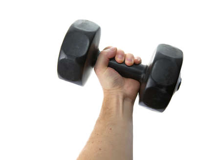 Working out by lifting weightの写真素材