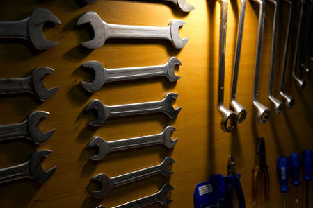 Tools in a dark workshop in dim lightの写真素材