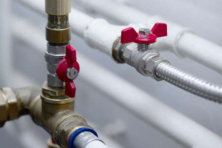 Pipes and valves of a heating systemの写真素材