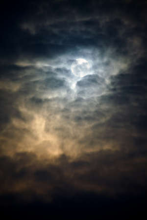 Dark winter sky with thick clodsの写真素材