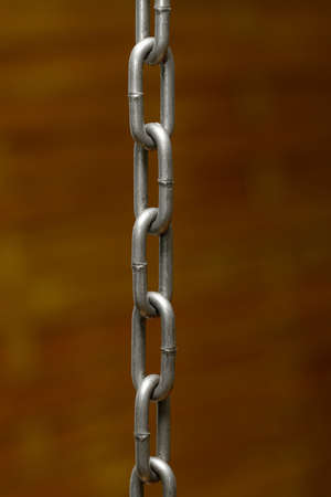 Chain hanging from aboveの写真素材