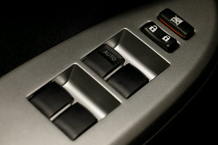 Window adjustment buttons on a car