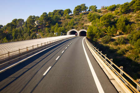Highway with tunnelsの写真素材