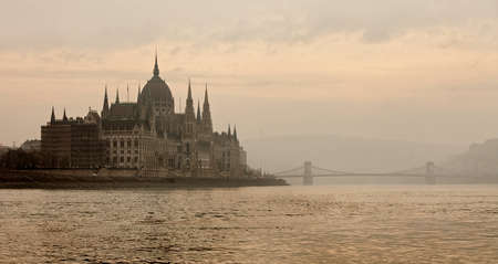 Hungarian Parliament building in misty sunsetの写真素材