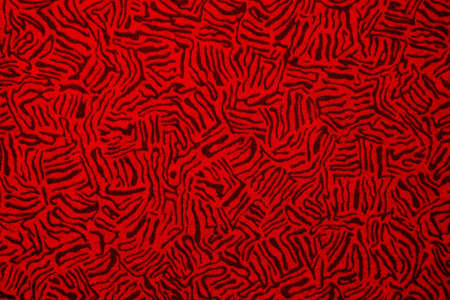 Abstract red background pattern with maze-like shapeの写真素材