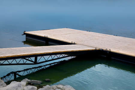 Wooden pier in the waterの写真素材