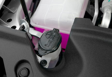 Windscreen wiper liquid container of a car