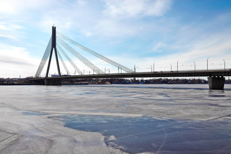 Bridge in Riga over the frozen Daugava riverの写真素材