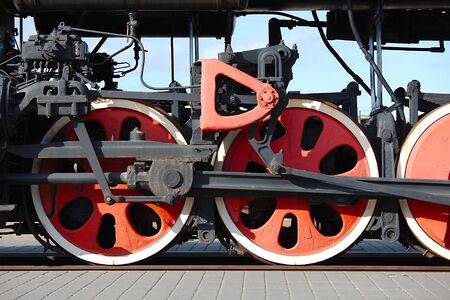 Steam locomotive detail with cranks and wheelsの写真素材