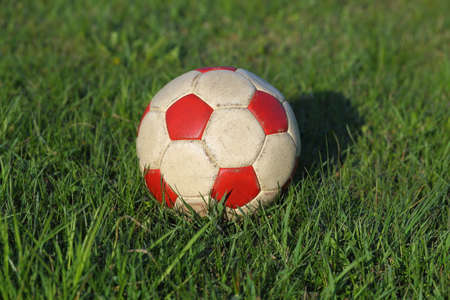 Football with generic pattern on the grassの写真素材