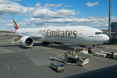 OSLO, NORWAY - MAY 3, 2015: Emirates Boeing 777-300ER ready for boarding at Oslo Gardermoen airport.のeditorial素材