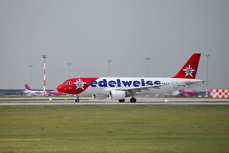 BUDAPEST, HUNGARY - MAY 5: Edelweiss A320 landing at Budapest Liszt Ferenc Airport, May 5th 2013. Edelweiss is Swiss airline.のeditorial素材