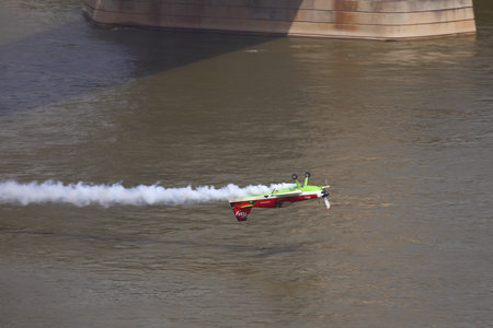 BUDAPEST, HUNGARY - MAY 1: Zoltan Veres fly under the Chainbridge as part of the May 1 celebration...