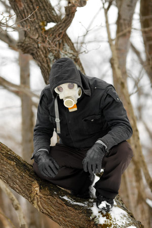 Man in Gas Mask lurking in the forest