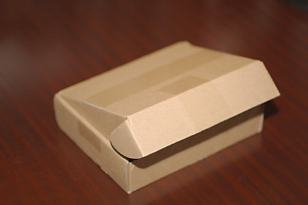Open cardboard box on a table