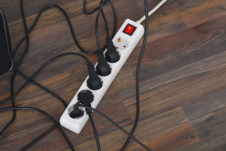Plugged in electric devices in an extension cord