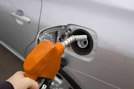 Fuel nozzle with hose isolated on white backgroundの写真素材