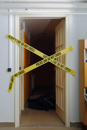 Crime scene closed with yellow stripes