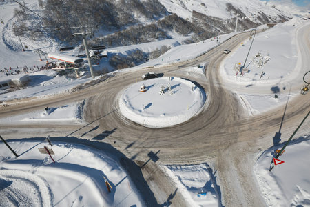 Snowy roundabout viewed from above