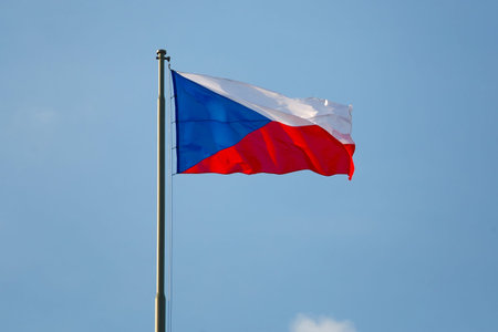 Czech flag waving against blue skyの写真素材
