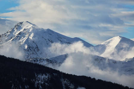 Snowy mountains in winter weatherの写真素材