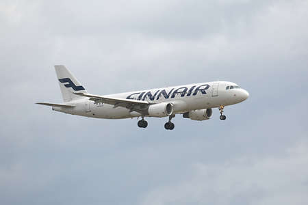 COPENHAGEN, DENMARK - MAY 13: Finnair A320 approaching Kastrup Airport, May 13th 2015. Finnair is Finland's flag-carrier airline.のeditorial素材
