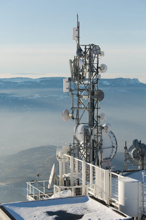 Communication transmitter towers in the snow