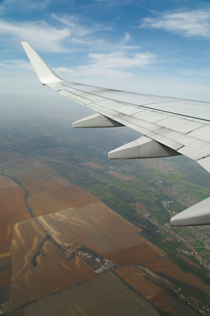 Sunrise view from an aircraft - Never forget to book a seat by the window