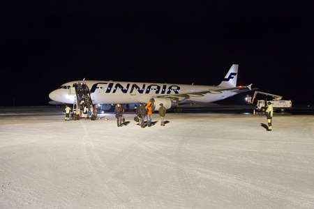 IVALO, FINLAND - DECEMBER 7, 2015 - Finnair airliner after landing at Ivalo, the northernmost airport of Finland. Ivalo is a popular destination for outdoor activites in Lapland.のeditorial素材