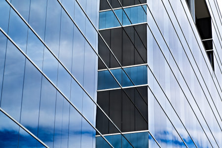 Modern office building detail, glass surface