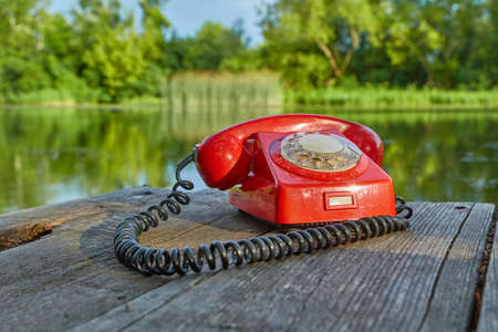 Old telephone in natureの写真素材