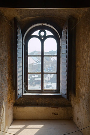 Old window in a towerの写真素材