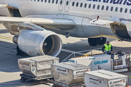 BUDAPEST, HUNGARY - MARCH 23, 2017: Cargo containers loaded into a Lufthansa aircraft at Budapest Liszt Ferenc Internetional Airportのeditorial素材