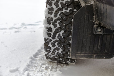 Car tyre in snow