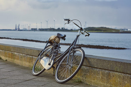 Bicycle on the road along the river