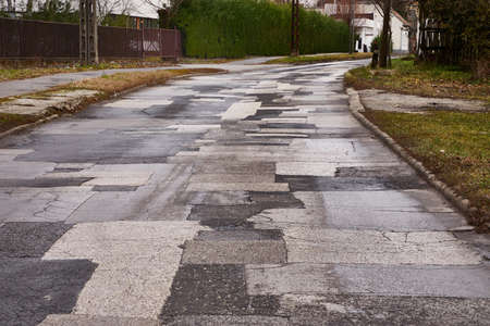 Patched broken roadの写真素材