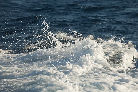 Waves hitting shore