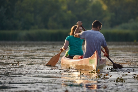 Canoe tour on a riverの写真素材