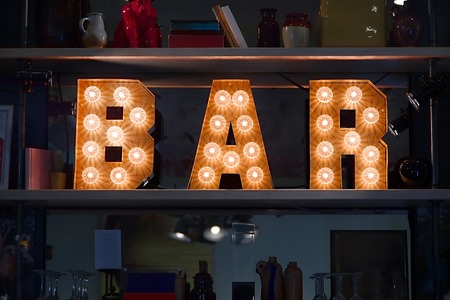 Bar sign made of lightの写真素材