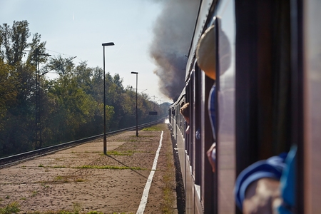Train journey with steam train, looking out the windowの写真素材