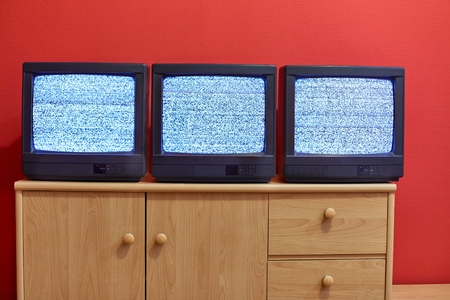 Three old TV setsの写真素材