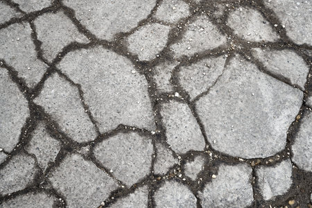Stone pavement broken near construction