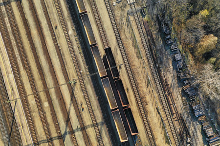 Many railway tracks industrial aerial drone viewの写真素材