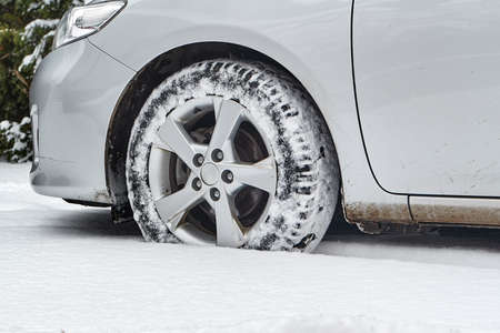 Car tyre in snowの写真素材