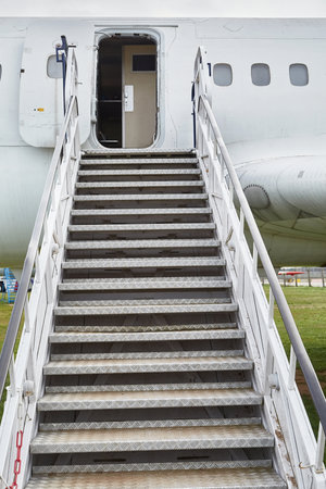 Airport stairs to a planeの写真素材