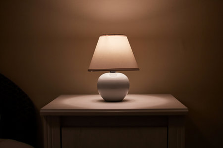 Lamp on a nightstandの写真素材